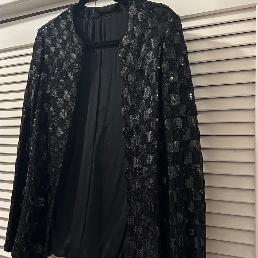 Beautiful vintage black sequin jacket.   The pattern square boxes - small